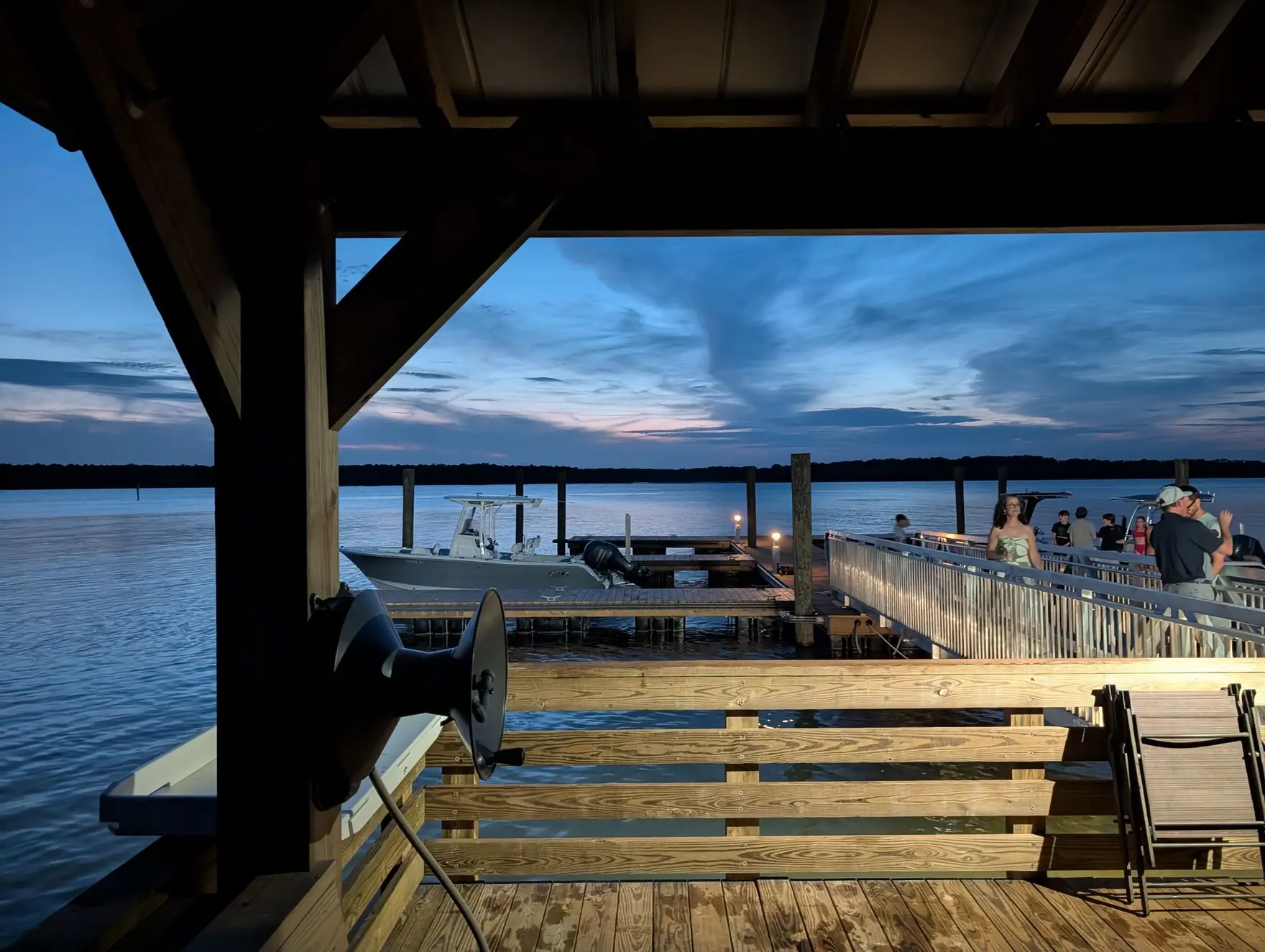 Evening on a Mount Pleasant community dock, boats tied up at dusk